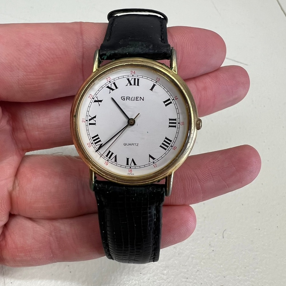 Gruen Mens Quartz Watch Gold Tone Roman Numeral White Dial Black Leather Strap‎